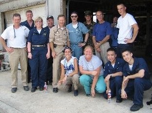 Picture of Hurricane Katrina Volunteers who assisted in the building of a clinic in Biloxi. Included among the volunteers is Dr. Jeffrey Harris, Current Member of the Board of Regents, who is pictured on the top row, second from the right.